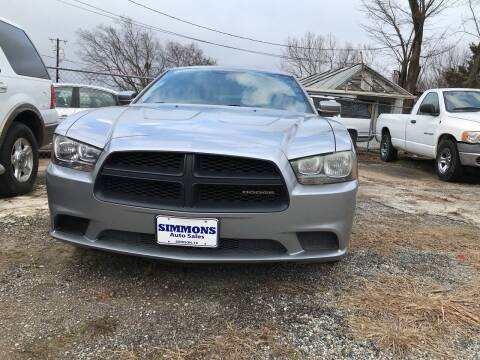 2011 Dodge Charger for sale at Simmons Auto Sales in Denison TX