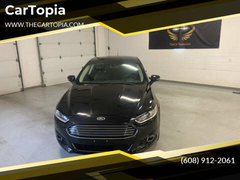 2014 Ford Fusion for sale at CarTopia in Deforest WI