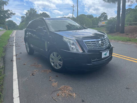 2016 Cadillac SRX for sale at THE AUTO FINDERS in Durham NC