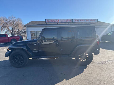 2015 Jeep Wrangler Unlimited for sale at Automart 150 in Council Bluffs IA