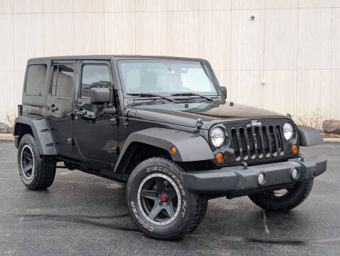 2012 Jeep Wrangler Unlimited for sale at Albo Auto Sales in Palatine IL