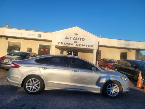 2016 Ford Fusion for sale at A-1 AUTO AND TRUCK CENTER in Memphis TN