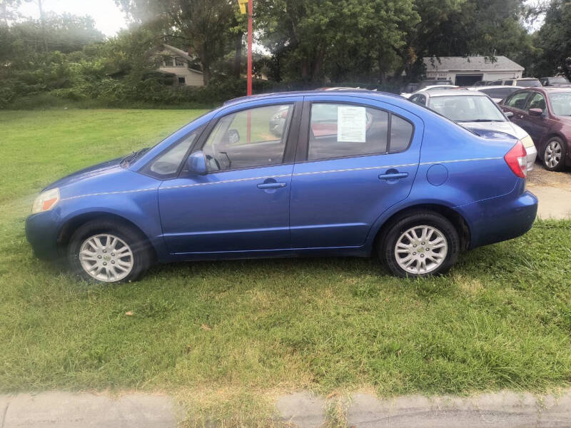 2013 Suzuki SX4 Sedan LE's photo