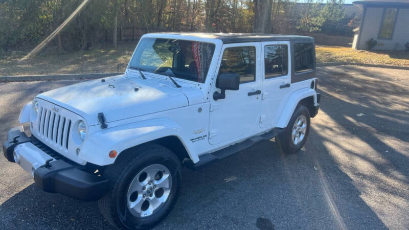 2014 Jeep Wrangler Unlimited for sale at AMG Automotive Group in Cumming GA