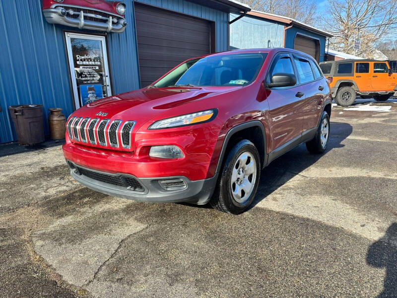 2015 Jeep Cherokee for sale at Rombaugh's Auto Sales in Battle Creek MI