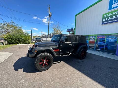 2013 Jeep Wrangler Unlimited for sale at Bay City Autosales in Tampa FL