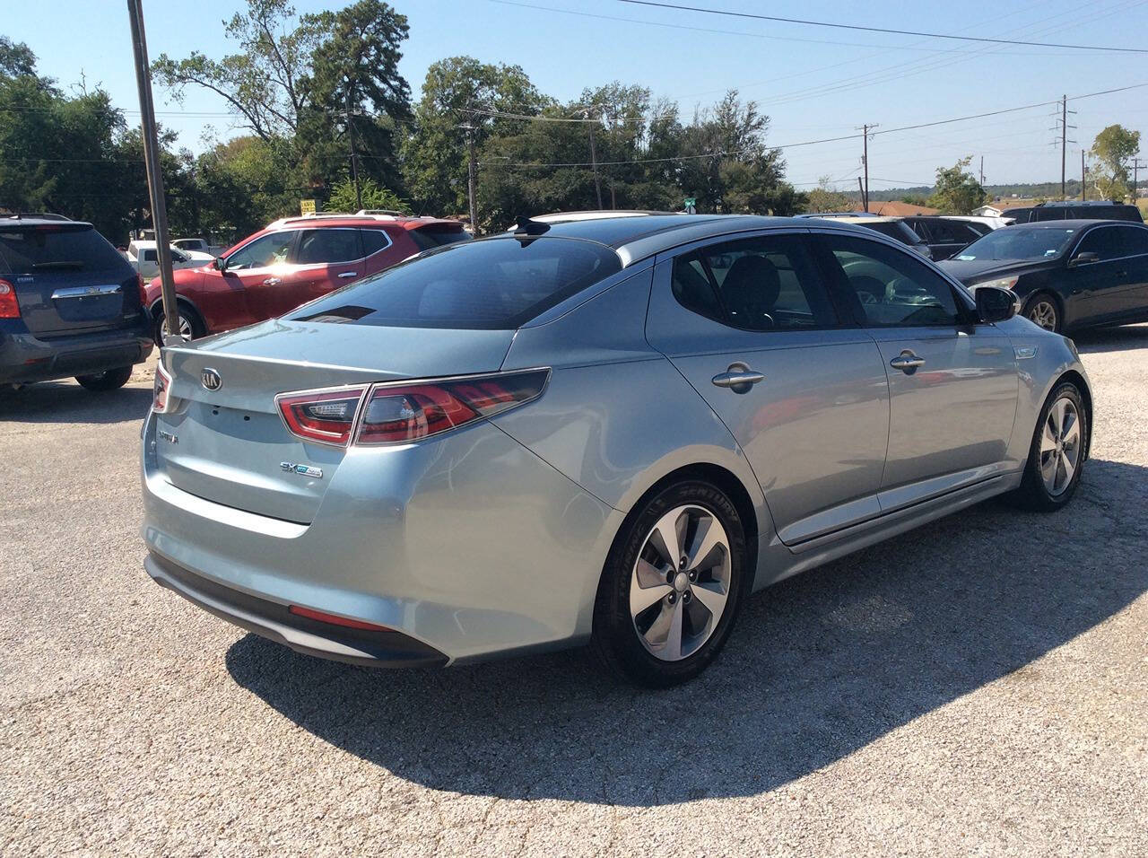 2014 Kia Optima Hybrid for sale at SPRINGTIME MOTORS in Huntsville, TX