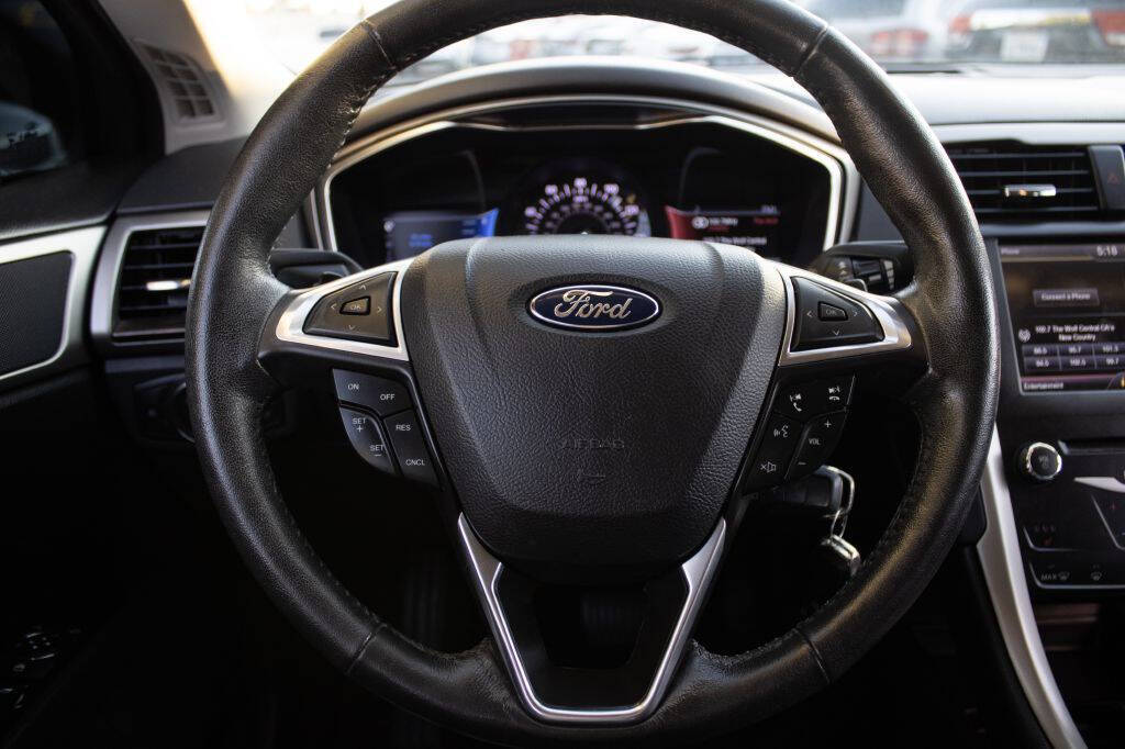 2014 Ford Fusion for sale at SUBLIME AUTO in Fresno, CA