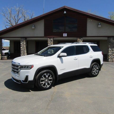 Used 2021 GMC Acadia SLE with VIN 1GKKNRL49MZ136890 for sale in Sheridan, WY