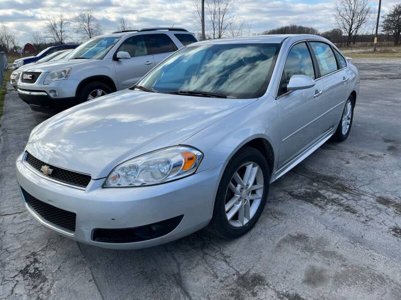 2012 Chevrolet Impala for sale at HEDGES USED CARS in Carleton MI