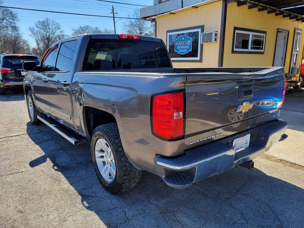 2014 Chevrolet Silverado 1500 for sale at DAGO'S AUTO SALES LLC in Dalton, GA