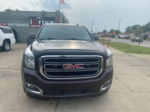 2015 GMC Yukon for sale at iDrive Auto Group in Eastpointe MI