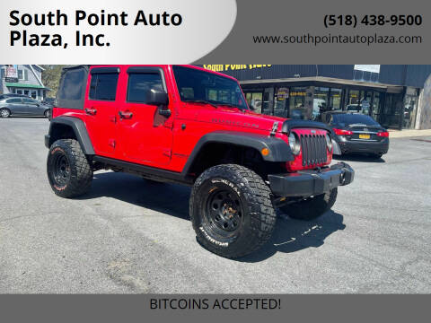 2014 Jeep Wrangler Unlimited for sale at South Point Auto Plaza, Inc. in Albany NY