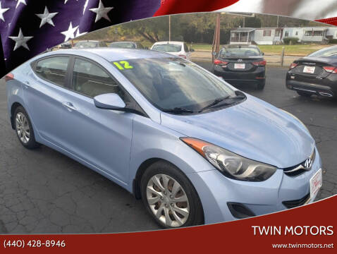 2012 Hyundai Elantra for sale at TWIN MOTORS in Madison OH