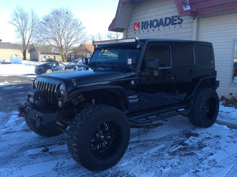 2014 Jeep Wrangler Unlimited for sale at Rhoades Automotive Inc. in Columbia City IN