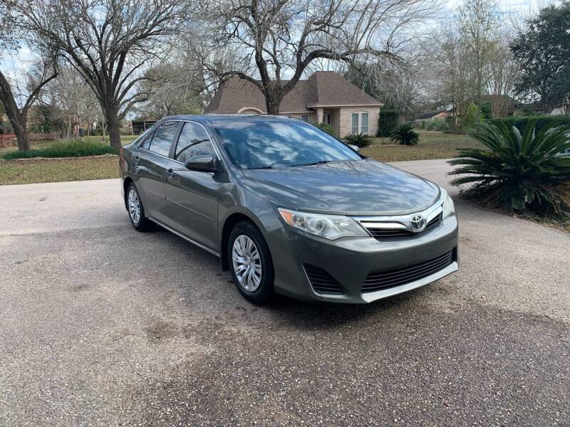 2014 Toyota Camry for sale at Sertwin LLC in Katy TX