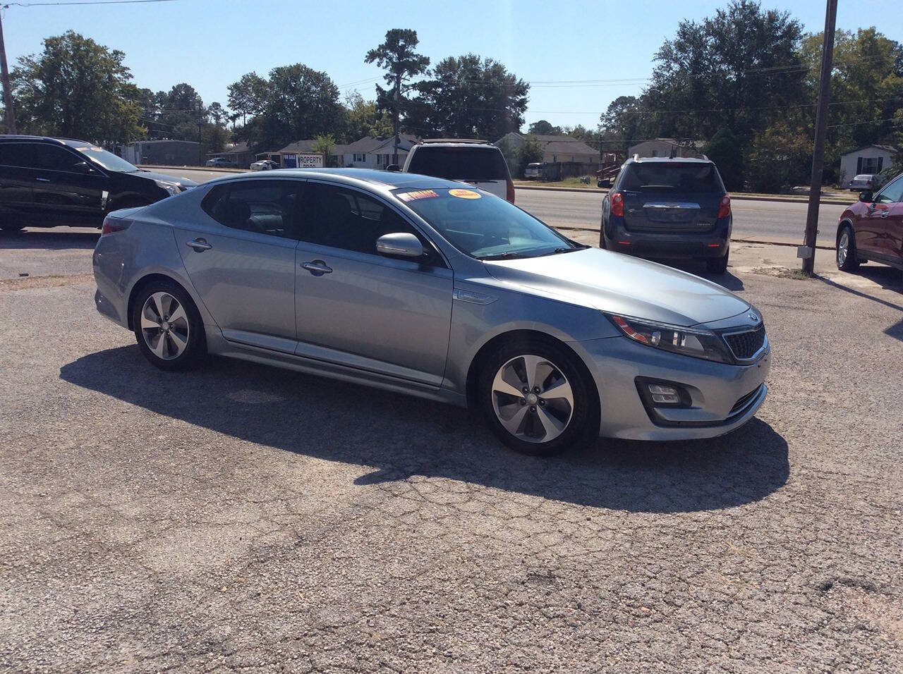 2014 Kia Optima Hybrid for sale at SPRINGTIME MOTORS in Huntsville, TX