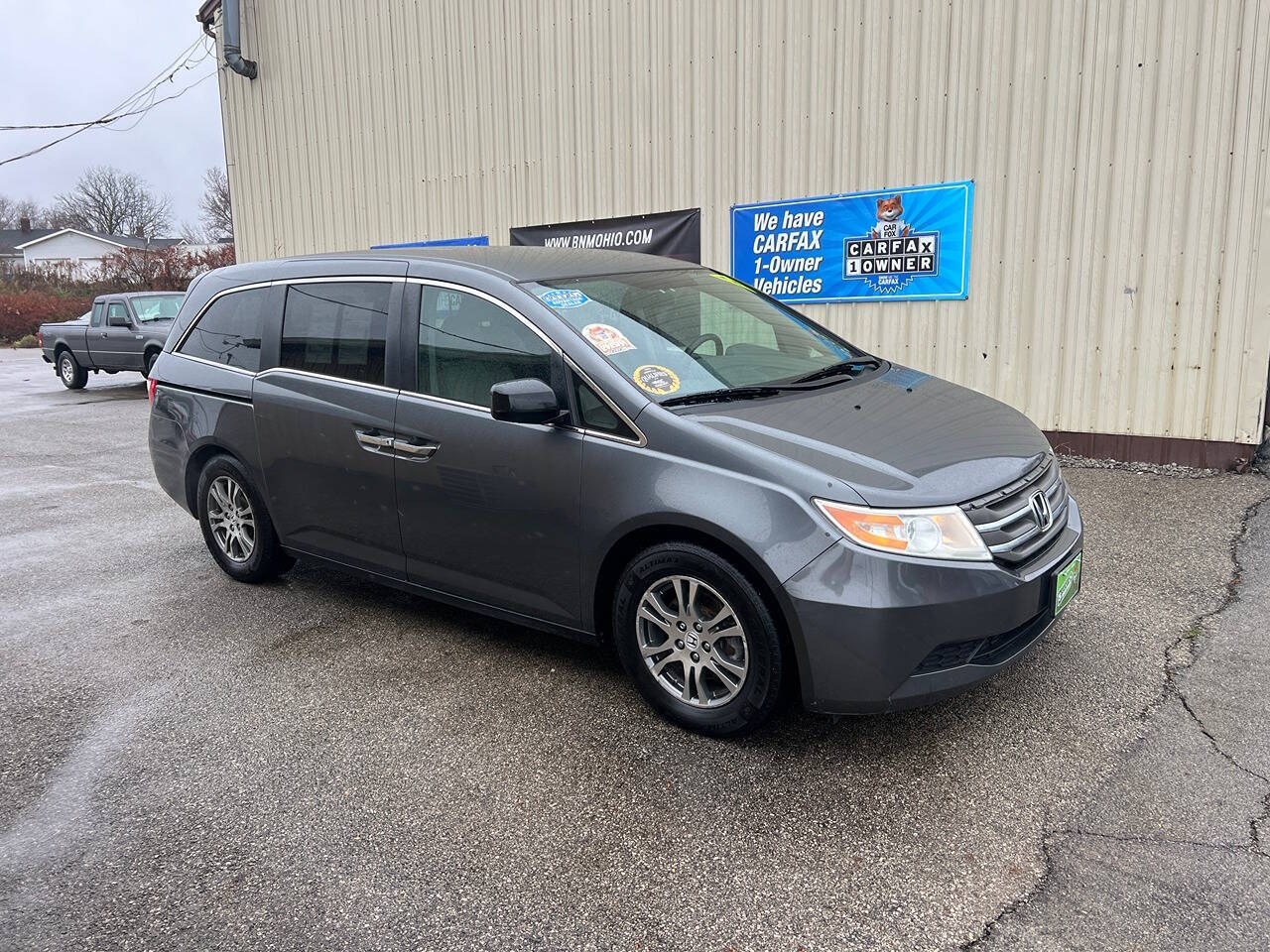 2013 Honda Odyssey for sale at BNM AUTO GROUP in GIRARD, OH