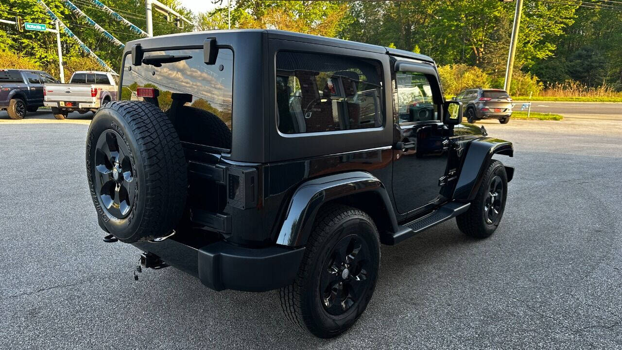 2016 Jeep Wrangler for sale at North Ridge Auto Center LLC in Madison, OH