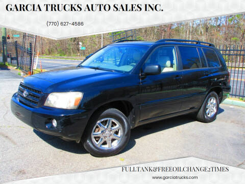 2004 Toyota Highlander for sale at Garcia Trucks Auto Sales Inc. in Austell GA