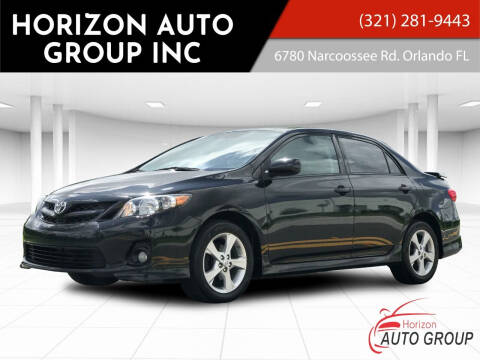 2013 Toyota Corolla for sale at HORIZON AUTO GROUP INC in Orlando FL