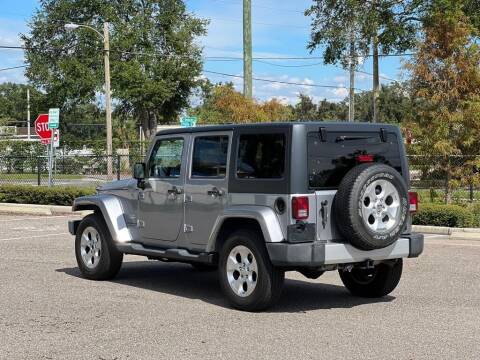 2013 Jeep Wrangler Unlimited for sale at Carlando in Lakeland FL