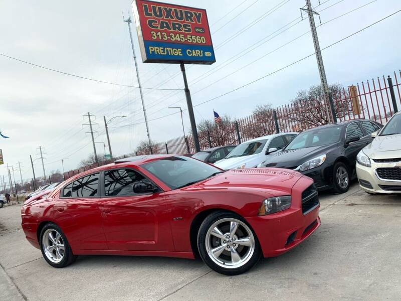 2013 Dodge Charger for sale at Dymix Used Autos & Luxury Cars Inc in Detroit MI