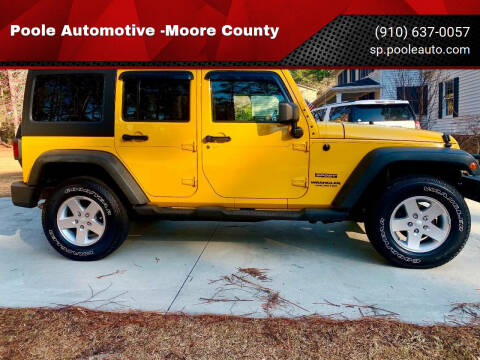 2011 Jeep Wrangler Unlimited for sale at Poole Automotive in Laurinburg NC