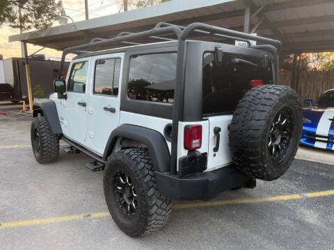 2014 Jeep Wrangler Unlimited for sale at TROPHY MOTORS in New Braunfels TX