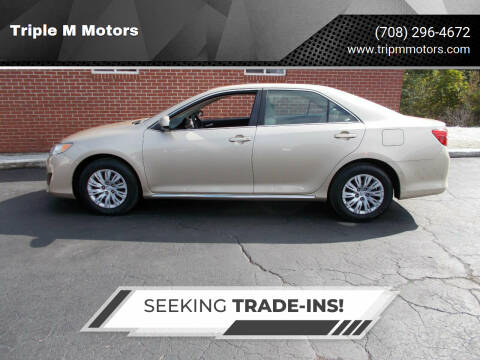 2012 Toyota Camry for sale at Triple M Motors in Saint John IN