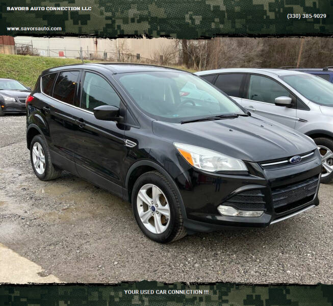 2014 Ford Escape for sale at SAVORS AUTO CONNECTION LLC in East Liverpool OH
