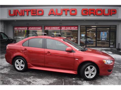 2013 Mitsubishi Lancer for sale at United Auto Group in Putnam CT