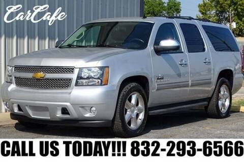 2014 Chevrolet Suburban for sale at CAR CAFE LLC in Houston TX