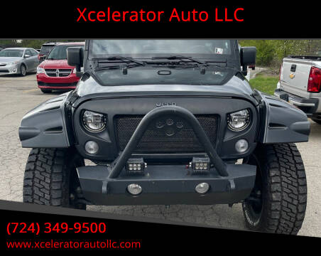 2014 Jeep Wrangler Unlimited for sale at Xcelerator Auto LLC in Indiana PA