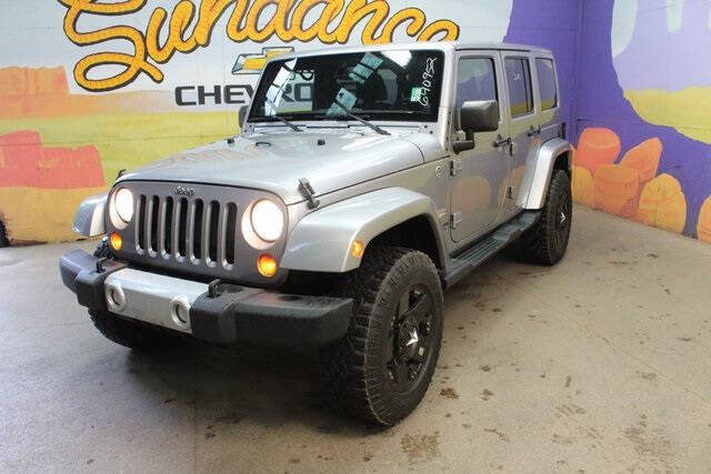 Used 2013 Jeep Wrangler Unlimited Sahara with VIN 1C4BJWEG5DL640952 for sale in Grand Ledge, MI