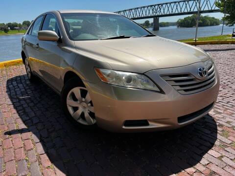 2009 Toyota Camry for sale at PUTNAM AUTO SALES INC in Marietta OH