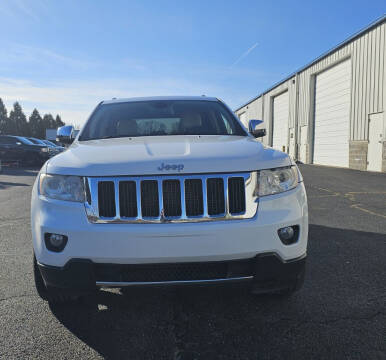 2013 Jeep Grand Cherokee for sale at Revolution Auto Inc in McHenry IL