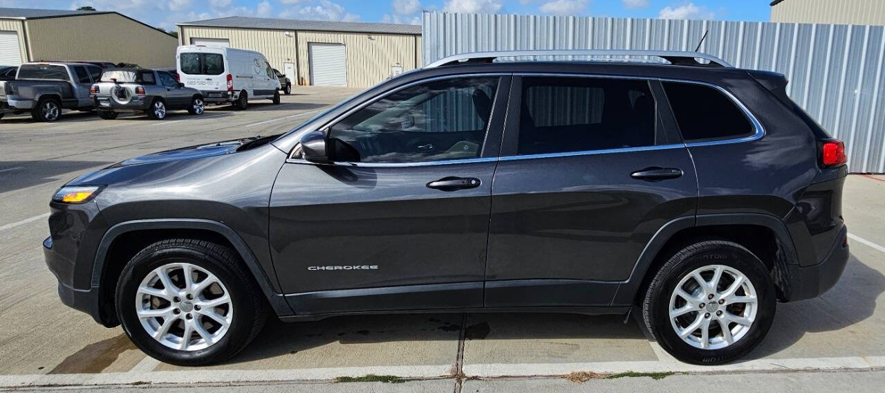 2017 Jeep Cherokee for sale at CAR MARKET AUTO GROUP in Sugar Land, TX