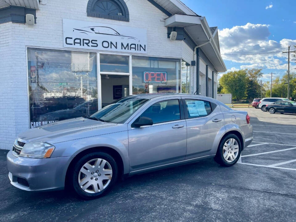 2014 Dodge Avenger for sale at Cars On Main in Findlay, OH