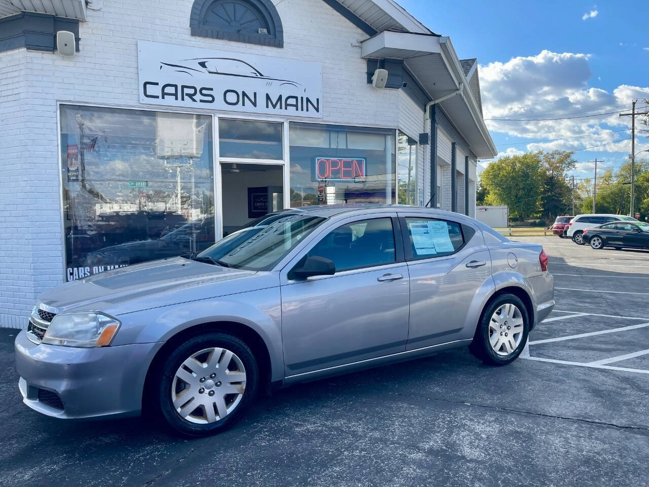 2014 Dodge Avenger for sale at Cars On Main in Findlay, OH