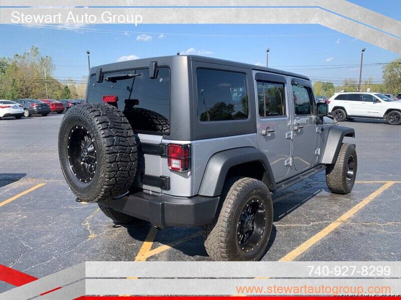 2016 Jeep Wrangler Unlimited for sale at Stewart Auto Group in Pataskala, OH