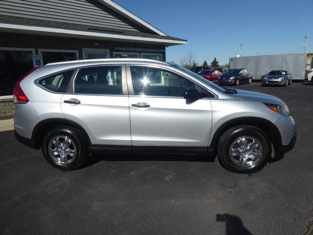 2012 Honda CR-V for sale at Lakeshore Autos in Holland, MI