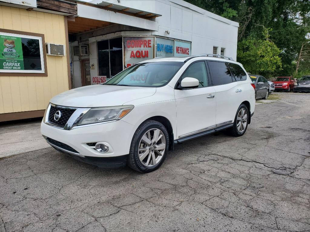 2014 Nissan Pathfinder for sale at DAGO'S AUTO SALES LLC in Dalton, GA