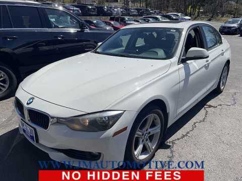 2013 BMW 3 Series for sale at J & M Automotive in Naugatuck CT