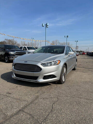 2014 Ford Fusion for sale at R&R Car Company in Mount Clemens MI