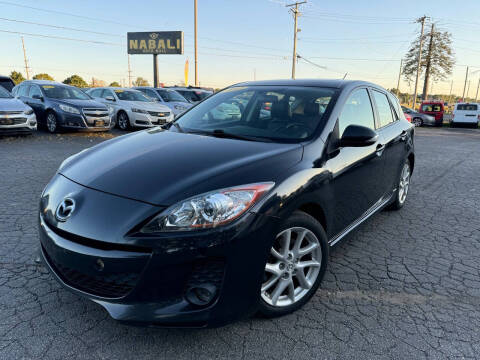 2012 Mazda MAZDA3 for sale at ALNABALI AUTO MALL INC. in Machesney Park IL