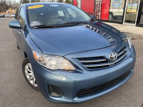 2013 Toyota Corolla for sale at 4 Wheels Premium Pre-Owned Vehicles in Youngstown OH