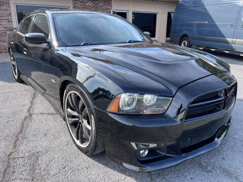 2012 Dodge Charger for sale at North Georgia Auto Brokers in Snellville GA
