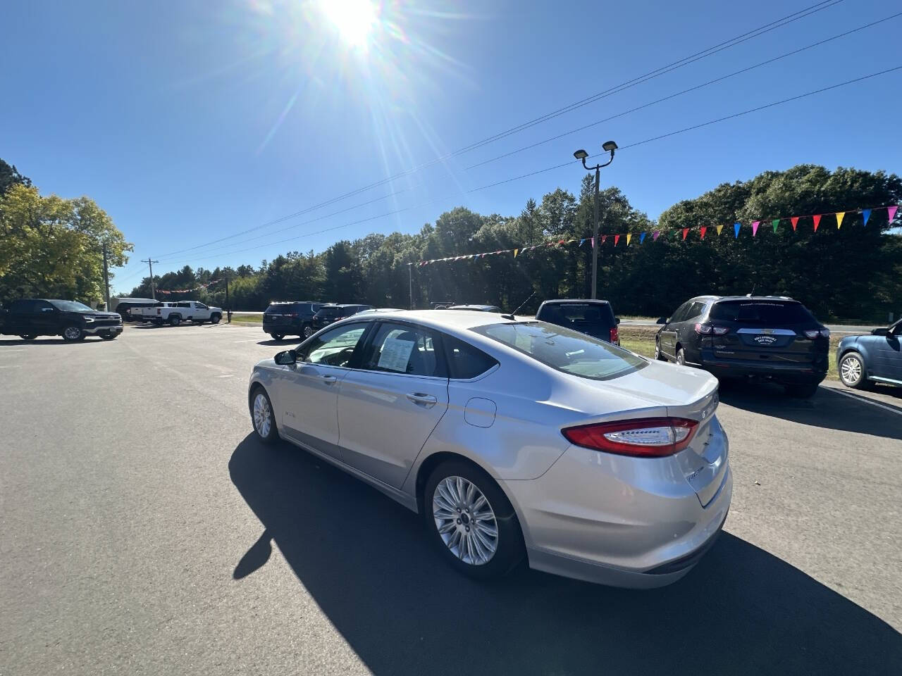 2016 Ford Fusion Hybrid for sale at Auto Hunter in Webster, WI