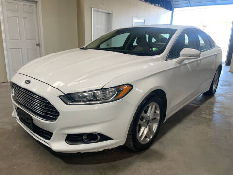 2014 Ford Fusion for sale at Safe Trip Auto Sales in Dallas TX